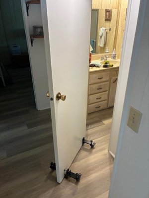Rehang bathroom door in mobile home swing the other way.to - Mobile home modifications