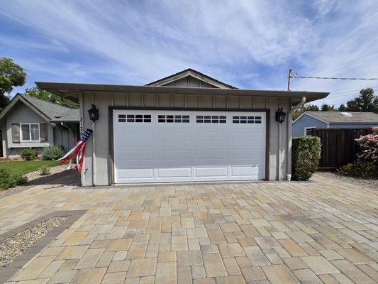 In Stock Garage Doors - Your garage door has served you well, but over time, frequent use can cause wear and tear. At Generational Garage Doors, we have a great selection of ready-to-go doors to keep your garage functioning smoothly — with no long delays or waiting on special orders.
Choose from long-panel or short-panel doors, carriage-stamped designs, in classic white or almond. We offer everything from non-insulated to fully insulated doors, with or without glass options, so you can find the perfect fit for your home and your needs — all available and ready for installation.