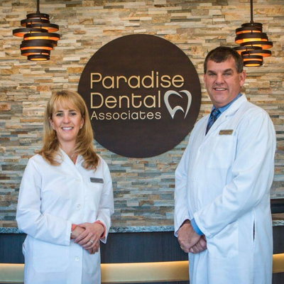 Meet the Doctors at Paradise Dental Associates - When was the last time you had your blood pressure checked at a dentist’s office? Here at Paradise Dental Associates, we care not only about your dental health but also your overall health. We care about taking the extra steps to provide a truly memorable experience for you. At each appointment, we greet you the way you would expect to be greeted as a guest at someone’s home. We show you around, explain everything you want to know, and even offer you some special comforts to make you feel at home. Our close-knit team coordinates and executes nearly every aspect of your family’s dental care in-house, saving you time, hassles, and visits elsewhere. Our specialists and staff look out for you before, during, and after treatment—from your very first phone call to the post-treatment follow-up call. Our ongoing goal is to give you an experience unlike any other, one which will make you and your family look forward to coming back for your next appointment!