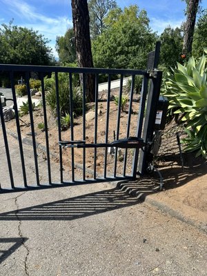 New LA400 swing gate operator by Liftmaster - We installed a new LiftMaster LA400 swing gate opener system for a residential property. The installation included safety eyes, wireless keypad access, handheld remotes, complete setup, programming, and safety check. The new system provides smooth gate operation, better security, and easy access for the homeowner. New LA400 swing gate operator by Liftmaster - We installed a new LiftMaster LA400 swing gate opener system for a residential property. The installation included safety eyes, wireless keypad access, handheld remotes, complete setup, programming, and safety check. The new system provides smooth gate operation, better security, and easy access for the homeowner.