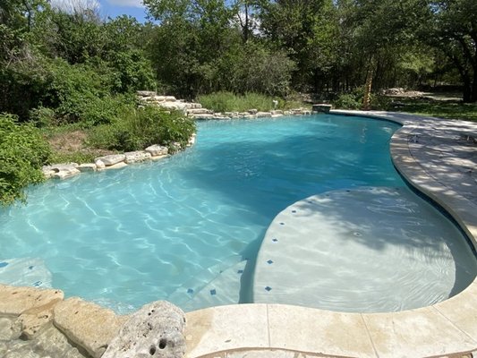 Ranch Oasis Cleanup - When we arrived, the pool and spa were in very bad shape, with many generations of nuclear green algae taking over. The Flow team immediately lowered the pH, superchlorinated, and brushed the entire pool to begin killing the algae. We then cleaned the Pentair diatomaceous earth filter, vacuumed dead debris to waste twice over, and balanced the water chemistry. From the client's initial outreach to a completely clear, fully operational pool, this cleanup took a total of five visits over four days. Ranch Oasis Cleanup - When we arrived, the pool and spa were in very bad shape, with many generations of nuclear green algae taking over. The Flow team immediately lowered the pH, superchlorinated, and brushed the entire pool to begin killing the algae. We then cleaned the Pentair diatomaceous earth filter, vacuumed dead debris to waste twice over, and balanced the water chemistry. From the client's initial outreach to a completely clear, fully operational pool, this cleanup took a total of five visits over four days.
