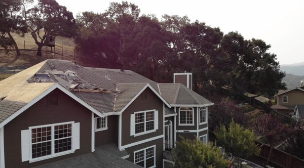 Novato Comp Shingle Reroof - This is a beautiful house that had leaks on its old roof. With the reroof, we did not only protected the house but also added value to the property.