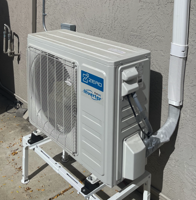 Garage mini split system - A 2-ton mini-split keeps the garage perfectly cool and comfortable, making it a great space for exercising even on the hottest days