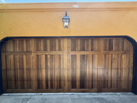 C.H.I wood overlay with walnut stain and a side mount Liftmaster opener. - C.H.I wood overlay with walnut stain and a side mount Liftmaster opener. The opportunity to install this wood overlay carriage house 16x7 garage door for a customer resulted in a truly beautiful outcome! C.H.I wood overlay with walnut stain and a side mount Liftmaster opener. - C.H.I wood overlay with walnut stain and a side mount Liftmaster opener. The opportunity to install this wood overlay carriage house 16x7 garage door for a customer resulted in a truly beautiful outcome!