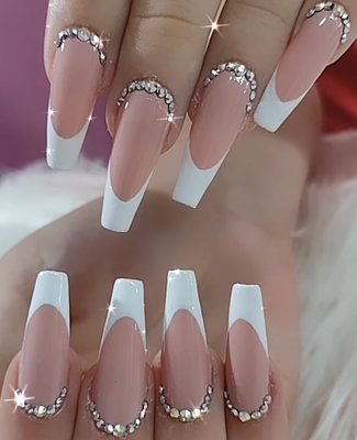 French Tip Full Set - This is the model of an elegant French Tip with diamond placements! French Tip Full Set - This is the model of an elegant French Tip with diamond placements!