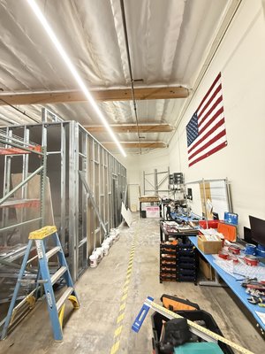 WAREHOUSE ADDITION - We started with empty warehouse space and constructed a testing room for there smoke devices.