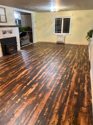 Floor rennovation - This was an older house that had carpet to start. The wood under the carpet was beautiful but the owner wanted an older rustic look. We sanded accordingly and the owner loved these floors. Floor rennovation - This was an older house that had carpet to start. The wood under the carpet was beautiful but the owner wanted an older rustic look. We sanded accordingly and the owner loved these floors.