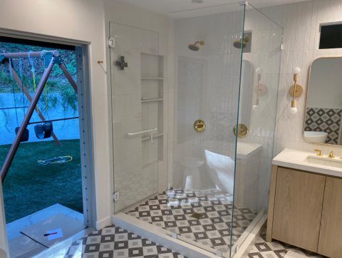 Complete bathroom remodel with his and hers sinks with ￼Diamond tile design. - This beautiful custom remodel of a bathroom with eight 48 x 48“ dual shower fixture shower, Diamond design tile installation throughout. Complete from start to finish. ￼￼￼￼