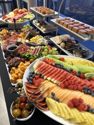 Charcuterie Tables & Board Display - At SAVOR, we specialize in creating exquisite charcuterie displays that are perfect for any event. Our beautifully arranged charcuterie boards feature a selection of the finest meats, cheeses, fresh fruits, and artisanal accompaniments, all curated to please even the most discerning palates. Whether you're hosting an intimate gathering or a large celebration, our charcuterie displays add a touch of elegance and sophistication, making them the ideal centerpiece for your occasion. Let us elevate your event with a culinary experience that's as visually stunning as it is delicious! Charcuterie Tables & Board Display - At SAVOR, we specialize in creating exquisite charcuterie displays that are perfect for any event. Our beautifully arranged charcuterie boards feature a selection of the finest meats, cheeses, fresh fruits, and artisanal accompaniments, all curated to please even the most discerning palates. Whether you're hosting an intimate gathering or a large celebration, our charcuterie displays add a touch of elegance and sophistication, making them the ideal centerpiece for your occasion. Let us elevate your event with a culinary experience that's as visually stunning as it is delicious!