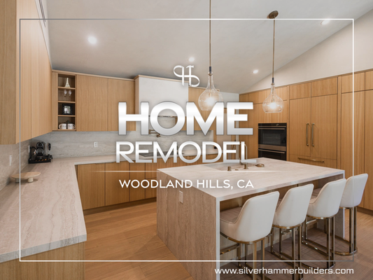 Full Home Remodeling | Woodland Hills, CA - A bright and modern kitchen with custom wood cabinets, stone countertops, and a spacious island with seating. Built-in appliances and clean lines create a sleek look, while warm tones and soft lighting make the space inviting and functional. Full Home Remodeling | Woodland Hills, CA - A bright and modern kitchen with custom wood cabinets, stone countertops, and a spacious island with seating. Built-in appliances and clean lines create a sleek look, while warm tones and soft lighting make the space inviting and functional.