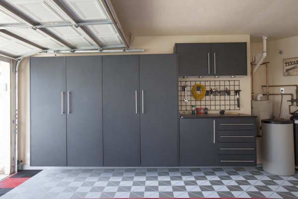 Garages - Let us help you to organize your garage and take back that space that was cluttered and not useable. We have overhead racks, slat wall organization, beautiful cabinets and Swiss Trax flooring to transform your garage into a space you will love! Garages - Let us help you to organize your garage and take back that space that was cluttered and not useable. We have overhead racks, slat wall organization, beautiful cabinets and Swiss Trax flooring to transform your garage into a space you will love!