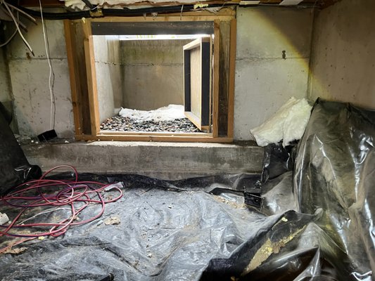 Flooded Crawl Space in Mount Hood Parkdale - This crawl space was section off into multiple levels, and the lowest level was a flooded mess of water. The space smelled damp and musty and the owners knew that this couldn't be good for their health. To help out, they contacted John's Waterproofing to learn about our full encapsulation.