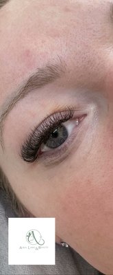 Volume Lashes - Transform your look with our Volume Lash extensions. Our skilled estheticians craft multi-dimensional lashes, adding depth and fullness for a bold, dramatic appearance. Perfect for those seeking a glamorous, statement-making look that commands attention. Experience voluminous lashes that exude confidence and style