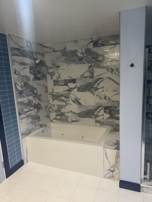 Bathroom Remodel - Bathroom was completely remodeled, re-tiled bathtub, shower, wall tile added, new flooring, and paint. Bathroom Remodel - Bathroom was completely remodeled, re-tiled bathtub, shower, wall tile added, new flooring, and paint.