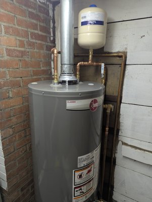 Gas Water Heater - I know everyone likes air conditioning... I do too.... but maybe not in front of the water heater? This took some skill, some strength, and some coordination. We cut and removed this braised gas manifold, built a wooden brace to protect the heater, and he-man hefted the old out to get the new in. Great opportunity and extremely happy customer! Gas Water Heater - I know everyone likes air conditioning... I do too.... but maybe not in front of the water heater? This took some skill, some strength, and some coordination. We cut and removed this braised gas manifold, built a wooden brace to protect the heater, and he-man hefted the old out to get the new in. Great opportunity and extremely happy customer!
