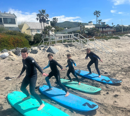 Group Surf Lessons - Have you always wanted to learn to surf? Learn from the best - Tony Z by the Sea! With over three decades of experience in all aspects of surfing and its culture, Tony Zapata has long been a valuable asset to Malibu’s surf scene. He offers group lessons, private lessons and packages for adults and kids.
By the age of 13, Tony made his competitive surfing debut, earning 6th out of a hundred and fifty surfers at the WSA West Coast Invitationals. By 15, he was placing 1st in surfing events and profiled in Surfer Magazine. And as a professional volleyball player, Tony was a winner of two out of three medals in Chile representing USA, as event winner in Montreal Canada competing representing USA, and a seven time champion of the prestigious Manhattan Beach 6-man Volleyball Tournament before moving on to coaching at Malibu High (two undefeated seasons) and Our Lady of Malibu (his Alma mater), as well as introducing beach volleyball clubs (Zuma Beach).
Tony’s background coaching pro volleyball made way for his transition to surf coaching. Teaching others is a mindset that comes naturally to Tony. He practices a See-Feel-Trust methodology, teaching an understanding of not only the ocean and surfing techniques, but also conquering fears and anxieties that come with trying something new. Tony will push you to be the best you can be while having fun, and celebrating your victories along the way.
Tony is also First Aid CPR certified.
Schedule your first lesson with Tony today! Group Surf Lessons - Have you always wanted to learn to surf? Learn from the best - Tony Z by the Sea! With over three decades of experience in all aspects of surfing and its culture, Tony Zapata has long been a valuable asset to Malibu’s surf scene. He offers group lessons, private lessons and packages for adults and kids.
By the age of 13, Tony made his competitive surfing debut, earning 6th out of a hundred and fifty surfers at the WSA West Coast Invitationals. By 15, he was placing 1st in surfing events and profiled in Surfer Magazine. And as a professional volleyball player, Tony was a winner of two out of three medals in Chile representing USA, as event winner in Montreal Canada competing representing USA, and a seven time champion of the prestigious Manhattan Beach 6-man Volleyball Tournament before moving on to coaching at Malibu High (two undefeated seasons) and Our Lady of Malibu (his Alma mater), as well as introducing beach volleyball clubs (Zuma Beach).
Tony’s background coaching pro volleyball made way for his transition to surf coaching. Teaching others is a mindset that comes naturally to Tony. He practices a See-Feel-Trust methodology, teaching an understanding of not only the ocean and surfing techniques, but also conquering fears and anxieties that come with trying something new. Tony will push you to be the best you can be while having fun, and celebrating your victories along the way.
Tony is also First Aid CPR certified.
Schedule your first lesson with Tony today!