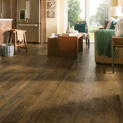 Vinyl - Laminate flooring is highly functional, stylish, and very durable. It is manufactured to mimic the appealing visuals of hardwood, slate, stone, or ceramic tile by fusing layers of wood-based materials together. Great for busy families, laminate installs easily, wears well and is available in a variety of breathtaking colors and styles.
There are four main layers used in laminate manufacturing: a surface wear layer, a photographic design of wood or stone, a core layer for added strength, and a backing layer for moisture protection and additional stability. You’ll also find some waterproof laminate flooring products that feature a waterproof backing and core. Vinyl - Laminate flooring is highly functional, stylish, and very durable. It is manufactured to mimic the appealing visuals of hardwood, slate, stone, or ceramic tile by fusing layers of wood-based materials together. Great for busy families, laminate installs easily, wears well and is available in a variety of breathtaking colors and styles.
There are four main layers used in laminate manufacturing: a surface wear layer, a photographic design of wood or stone, a core layer for added strength, and a backing layer for moisture protection and additional stability. You’ll also find some waterproof laminate flooring products that feature a waterproof backing and core.