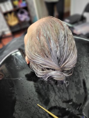Here, we are gray transitioning from vibrant red. This was her third session and we got there. - This lovely lady grew tired of touching up her new growth on her vibrant red haircolor. We transitioned back to grey without compromising the hairs integrity. I had her grow out a few months so I could see where to match the salt, and where to place the pepper. Without even touching her new growth I began to extract the artificial pigment low and slow to avoid damage. This took a total of three sessions over 6 months. And this lady is no longer committed to retouched every third week. We are both so pleased with the result. Here, we are gray transitioning from vibrant red. This was her third session and we got there. - This lovely lady grew tired of touching up her new growth on her vibrant red haircolor. We transitioned back to grey without compromising the hairs integrity. I had her grow out a few months so I could see where to match the salt, and where to place the pepper. Without even touching her new growth I began to extract the artificial pigment low and slow to avoid damage. This took a total of three sessions over 6 months. And this lady is no longer committed to retouched every third week. We are both so pleased with the result.