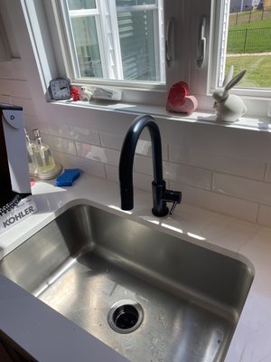 Kitchen faucet replacement - Andrea called saying she wanted to replace the faucet in her new home. I arrived within the hour to replace it with a gorgeous Koehler Sous faucet.