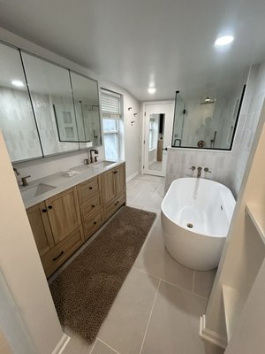 Bath Remodel - Glencoe - Full remodel of a bathroom. Utilize space to add bathtub that didn’t exist next to shower. Raise ceiling and enclose toilet area. Update electric and new exhaust fans. Bath Remodel - Glencoe - Full remodel of a bathroom. Utilize space to add bathtub that didn’t exist next to shower. Raise ceiling and enclose toilet area. Update electric and new exhaust fans.