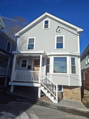 Newport Exterior Renovation - This project involved a comprehensive interior remodel and a full-scale window replacement for a residence in Newport, Rhode Island. The upgrade focused on enhancing energy efficiency while modernizing the aesthetic to match the city's iconic coastal charm.
Replaced every window to maximize natural light and improve insulation against Atlantic winds.
Integrated premium materials that bridge the gap between historic Newport elegance and modern functionality. Newport Exterior Renovation - This project involved a comprehensive interior remodel and a full-scale window replacement for a residence in Newport, Rhode Island. The upgrade focused on enhancing energy efficiency while modernizing the aesthetic to match the city's iconic coastal charm.
Replaced every window to maximize natural light and improve insulation against Atlantic winds.
Integrated premium materials that bridge the gap between historic Newport elegance and modern functionality.