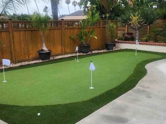 Putting Green Turf - Experience the ultimate backyard upgrade with our custom artificial turf putting greens. Our expertly designed and installed putting surfaces provide professional-quality play, year-round durability, and a stunning look for any outdoor space. Explore to see how we bring fun, functionality, and flawless putting performance right to your home.
