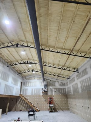 2025 Bardominium project - Installed traditional HVAC system in a high ceiling spray foam insulated metal building. We utilized "sock duct" in the space so the owner won't have to worry about condensation on/in the ductwork. This style of duct will provide the owner with many years of high efficiency cooling. This project also utilized a mini split system to cool a small efficiency unit within the building that is not shown in the pictures. 2025 Bardominium project - Installed traditional HVAC system in a high ceiling spray foam insulated metal building. We utilized "sock duct" in the space so the owner won't have to worry about condensation on/in the ductwork. This style of duct will provide the owner with many years of high efficiency cooling. This project also utilized a mini split system to cool a small efficiency unit within the building that is not shown in the pictures.