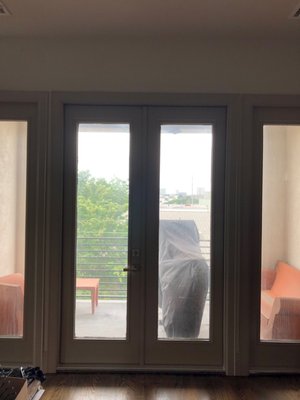 Before and After photos of glass doors - Our highly skilled and experienced window cleaners use professional equipment, innovative techniques, and eco-friendly cleaning solutions to leave you with pristine, streak-free windows and long-lasting results. We offer both interior and exterior window cleaning, and our superior attention to detail leaves no spot untouched. We are certified and fully insured.