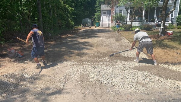 Long Asphalt Driveway - There's no way around it.  Perfectly flat and level ASPHALT requires old-fashioned hard work. The reward for doing the hard work comes later, often years later...

Brick City lifelong customers KNOW from experience that we will NEVER cut corners. There's a reason we are 3rd generation masons.