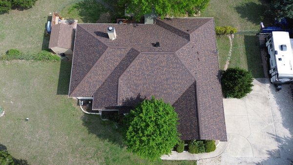 Liberty Hill Roof & Ventilation Upgrade! - This customer contacted us when their roof was too old to get their home insured, which is becoming more common!
We gave them a couple different options for their roof to select from and we’re so glad they chose to upgrade to the Lifetime Duration series from Owens Corning - this Brownwood color is so warm & rich!
We also substantially upgraded their ventilation system to ridge vents, combined with a 35W Attic Breeze solar fan that is sure to be appreciated in the hot summer months!
Need a trusted company for your roofing project? Call the pros out today and see what sets McCannical Roofing & Exteriors apart from our competition! Liberty Hill Roof & Ventilation Upgrade! - This customer contacted us when their roof was too old to get their home insured, which is becoming more common!
We gave them a couple different options for their roof to select from and we’re so glad they chose to upgrade to the Lifetime Duration series from Owens Corning - this Brownwood color is so warm & rich!
We also substantially upgraded their ventilation system to ridge vents, combined with a 35W Attic Breeze solar fan that is sure to be appreciated in the hot summer months!
Need a trusted company for your roofing project? Call the pros out today and see what sets McCannical Roofing & Exteriors apart from our competition!