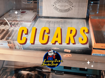 Lazzy Dazz Cigar Selection - Lazzy Dazz is the local spot for cigar lovers and anyone curious about quality smokes. Our smoke shop takes pride in offering a laid-back atmosphere where you can browse a variety of premium cigars, from popular classics to unique finds. Whether you're picking up a favorite or exploring something new, our friendly team is here to help you find just the right cigar for any occasion. Call us to see if we carry what you're looking for! Lazzy Dazz Cigar Selection - Lazzy Dazz is the local spot for cigar lovers and anyone curious about quality smokes. Our smoke shop takes pride in offering a laid-back atmosphere where you can browse a variety of premium cigars, from popular classics to unique finds. Whether you're picking up a favorite or exploring something new, our friendly team is here to help you find just the right cigar for any occasion. Call us to see if we carry what you're looking for!