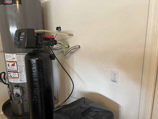 WATER HEATER Leak - Customer had a water leak coming from water heater we only did the build back dry wall tape mud  texture, paint replace baseboard