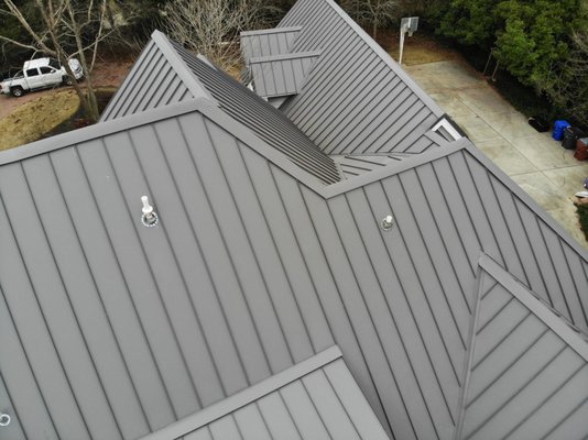 Metal Roof Installation - This is a beautiful standing seam metal roof that Colony Roofers installed for one of our customers. Metal roofs have many benefits including longevity, durability, and energy efficiency. Metal Roof Installation - This is a beautiful standing seam metal roof that Colony Roofers installed for one of our customers. Metal roofs have many benefits including longevity, durability, and energy efficiency.