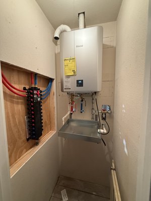 tank to tankless conversion - Replace your old tank water heater with a high-efficiency gas tankless water heater and modern manifold plumbing system. Enjoy endless hot water, improved water pressure, lower energy costs, and convenient fixture-specific shutoff valves. Perfect for bathroom remodels and home upgrades. Includes professional installation, system testing, and code-compliant connections for reliable long-term performance. tank to tankless conversion - Replace your old tank water heater with a high-efficiency gas tankless water heater and modern manifold plumbing system. Enjoy endless hot water, improved water pressure, lower energy costs, and convenient fixture-specific shutoff valves. Perfect for bathroom remodels and home upgrades. Includes professional installation, system testing, and code-compliant connections for reliable long-term performance.