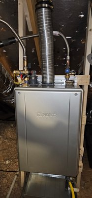 new tankless water heater - this customer had an old busted and leaking tank style water heater that needed replaced, so we installed a new tankless water heater with a 10 year warranty new tankless water heater - this customer had an old busted and leaking tank style water heater that needed replaced, so we installed a new tankless water heater with a 10 year warranty