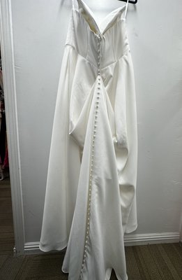 Wedding dress repair - The wedding dress needs to be altered , she wants to remove straps and add bussel , which is done perfectly, 
So you can see a sample to wedding dress alterations, 
I hope  you will give me chance to Do your , for your final fittings please call Aamber alterations 669-350-6821
Thanks