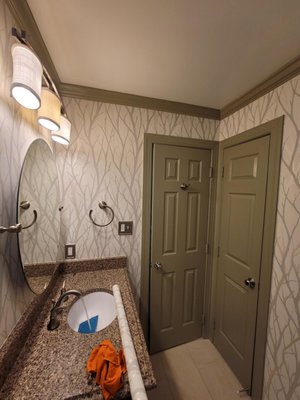 Wallpaper Project Powder room - Small powder rooms can be challenging for wallpaper installations. The many accessories in the powder room require many cuts. The cost for installation for this project was $350. Wallpaper Project Powder room - Small powder rooms can be challenging for wallpaper installations. The many accessories in the powder room require many cuts. The cost for installation for this project was $350.