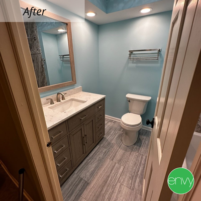 ARLINGTON HEIGHTS, IL SMALL BATHROOM REMODEL - Arlington Heights, IL small bathroom remodel, completed in 2022. These homeowners wanted to remodel their small hall bathroom to give it a face lift. They wanted to replace only the vanity, toilet and flooring. We removed the wall paper as well as the huge mirror above the vanity.
