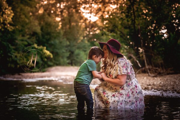 Creek mini Sessions - Creek sessions are (you guessed it) IN the creek! Yes you’ll get wet, but as soon as you get over the mental block of wearing something other than your swimsuit in the water, you’ll start having fun. If you have kids or even the family dog with you, trust me – they’ll be having fun regardless.

This quick mini session is one of the most laid back family photo sessions you’ll experience! My goal is to connect your beautiful family to the beauty nature brings in the summer.
