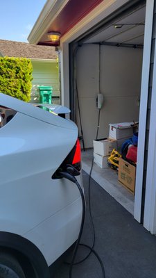 Tesla Install, Innis Arden - We removed an old obsolete 32A slow-charger, and installed a new 60A Tesla Wall Connector, for great home fast charging for our customer!