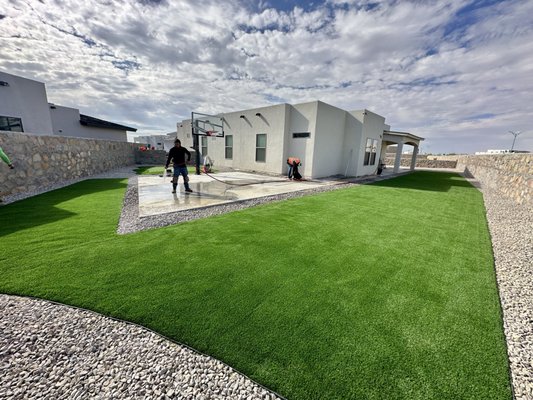 Family Friendly Backyard - At El Paso Artificial Grass, we specialize in creating high-quality, custom outdoor solutions that suit your family's unique needs—from vibrant, family-friendly backyards to durable, pet-friendly turf.

Imagine a backyard that combines the fun of a concrete basketball court with the beauty of lush, low-maintenance artificial grass—perfect for kids to play, pets to roam, and families to enjoy year-round.

Let us help you design the perfect outdoor space that’s both functional and beautiful.