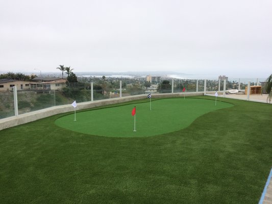 Putting Green - Transform Your Space with Our Putting Green Installation
Elevate your surroundings with our exceptional putting green installation service. Experience the thrill of having your very own golf oasis right at home.
Before: An ordinary space with untapped potential, waiting to be transformed into a golfer's paradise.
After: A meticulously designed and expertly installed putting green that brings the charm of the golf course to your doorstep. Imagine practicing your strokes on a surface that rivals the finest greens.
Our team of experts brings your vision to life, crafting a flawless putting green that caters to both beginners and enthusiasts. The lush, realistic turf invites you to hone your skills, enjoy friendly competitions, and create lasting memories with family and friends.
Whether you're an avid golfer or simply seeking to enhance your outdoor space, our putting green installation offers a blend of aesthetics, recreation, and relaxation. Get ready to enjoy endless golfing pleasure in the comfort of your own backyard.
Get in touch today to discuss your putting green dreams and let us help you make them a reality. Swing into the ultimate golfing experience with our premium installation service. Putting Green - Transform Your Space with Our Putting Green Installation
Elevate your surroundings with our exceptional putting green installation service. Experience the thrill of having your very own golf oasis right at home.
Before: An ordinary space with untapped potential, waiting to be transformed into a golfer's paradise.
After: A meticulously designed and expertly installed putting green that brings the charm of the golf course to your doorstep. Imagine practicing your strokes on a surface that rivals the finest greens.
Our team of experts brings your vision to life, crafting a flawless putting green that caters to both beginners and enthusiasts. The lush, realistic turf invites you to hone your skills, enjoy friendly competitions, and create lasting memories with family and friends.
Whether you're an avid golfer or simply seeking to enhance your outdoor space, our putting green installation offers a blend of aesthetics, recreation, and relaxation. Get ready to enjoy endless golfing pleasure in the comfort of your own backyard.
Get in touch today to discuss your putting green dreams and let us help you make them a reality. Swing into the ultimate golfing experience with our premium installation service.