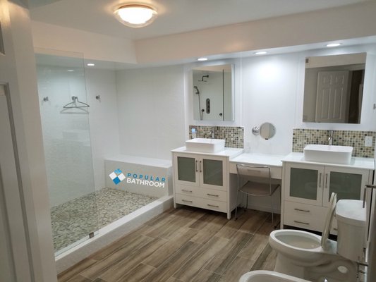 Toluca Lake Bathroom Remodeling - 2017 - Located on Riverside in Toluca Lake, a multi-level residential Luxury Condo has fallen from its grace. We have removed over 3 tons of mostly concrete and tile that made the Shower and Roman Tub, which was cast and poured in place when originally built. A New Large Walk-in Shower with plenty of wet areas to dry off. Open floor concept - no shower door, just a simple glass panel. New Shower Head, Hand Shower with Valve. New Double Soap and Shampoo Niche. New Shower with White Floor Tiles. New Shower Step. New Toilet and Bidet. Two (2) New Single Vanities and Make-up Drawers from Milan Gallery. Two (2) New Mirrors above the Vanities are from Kohler, and they are a Medicine Cabinet with 4 mirrors. New Wall Paint, New Bathroom Floor Tiles, with New Bathroom Lights.
See more on Yelp.com and call Popular Bathroom at (818) 267-8568 for your Free Consultation and Estimate from the Owner, Abraham Samara. Toluca Lake Bathroom Remodeling - 2017 - Located on Riverside in Toluca Lake, a multi-level residential Luxury Condo has fallen from its grace. We have removed over 3 tons of mostly concrete and tile that made the Shower and Roman Tub, which was cast and poured in place when originally built. A New Large Walk-in Shower with plenty of wet areas to dry off. Open floor concept - no shower door, just a simple glass panel. New Shower Head, Hand Shower with Valve. New Double Soap and Shampoo Niche. New Shower with White Floor Tiles. New Shower Step. New Toilet and Bidet. Two (2) New Single Vanities and Make-up Drawers from Milan Gallery. Two (2) New Mirrors above the Vanities are from Kohler, and they are a Medicine Cabinet with 4 mirrors. New Wall Paint, New Bathroom Floor Tiles, with New Bathroom Lights.
See more on Yelp.com and call Popular Bathroom at (818) 267-8568 for your Free Consultation and Estimate from the Owner, Abraham Samara.
