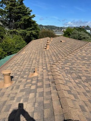 Pro Installation / Composition Shingle Roofs. - Composition roofs or commonly known also as shingle roofs are one of the most traditional and effective ways to protect your home from the rain. When compared to other roof systems, composition shingles represent one of the most budget conscious options. In this gallery we show details of professional installation, showcasing multiple shingle colors and roof details such as, ridge vent used to properly ventilate your attic space, o'hagin vents to help circulate the air and add extra ventilation, proper flashing installation, chimney metals (saddles) to properly channel the water out of chimney, as well as professional gutter installation to ensure  proper rain water management.