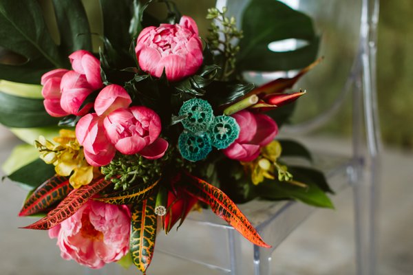 Tropical Styled Shoot - Florals by Bloom Bar & Co. Venue: Almagre. Photos by Maria B Photography. Wedding Planning/Design by Happy Lamb Weddings. Dress by Impressed by the Dress. Sweets by Bon Bon Bombardier. Calligraphy by Vineyard Ink Calligraphy. Jewelry by Laurel & Co. Rentals by Colorado Party Rentals. Suit by Jim's Formal Wear.