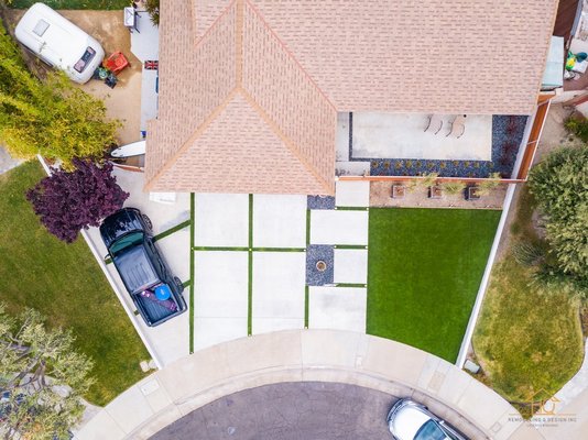 Modern Driveway and Front Yard Remodel by HQ Remodeling and Design in Fullerton, CA - Started with a 3D design, we transformed the front of the house to a modern concrete driveway with artificial turf, recessed lights, wood fence and gates and matching sidings Modern Driveway and Front Yard Remodel by HQ Remodeling and Design in Fullerton, CA - Started with a 3D design, we transformed the front of the house to a modern concrete driveway with artificial turf, recessed lights, wood fence and gates and matching sidings