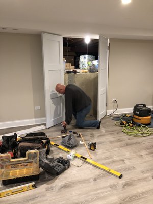 Double door installation - Empty storage space in need of doors. Double door installation - Empty storage space in need of doors.