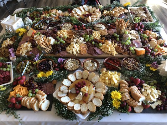 Charcuterie Displays - Our Classic Charcuterie Displays are a great way to enhance a large cocktail hour. They're plentiful enough that if you choose not to have any other hors d'oeuvres, your guests will have ample before their meal. These lavish displays are abundant enough that they will suffice for an entire cocktail party or for an afternoon get-together. Their spectacular presentation never fails to wow your guests. One of the great advantages to these gorgeous presentations are that they never looked picked over. You never have to worry about running out of food or having empty dishes on the table. Charcuterie Displays - Our Classic Charcuterie Displays are a great way to enhance a large cocktail hour. They're plentiful enough that if you choose not to have any other hors d'oeuvres, your guests will have ample before their meal. These lavish displays are abundant enough that they will suffice for an entire cocktail party or for an afternoon get-together. Their spectacular presentation never fails to wow your guests. One of the great advantages to these gorgeous presentations are that they never looked picked over. You never have to worry about running out of food or having empty dishes on the table.