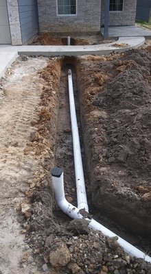 Sewer Repair - installed 60 ft of pvc to city sewer tie in. Tunneled and replaced 40 ft of pvc.