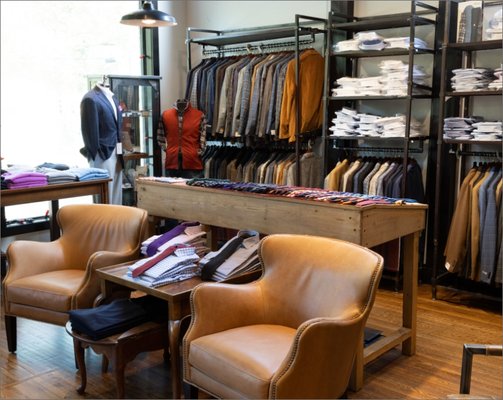 The Haymakers Experience - Step into our store, and you’ll feel right at home.

Located at West End Avenue & Acklen Park in a 1930s renovated bungalow, every visit to Haymakers & Co. is a unique blend of business and pleasure. Bring along your well-behaved, leashed dog if you like—we’re a dog-friendly establishment—and while just browsing or efficiently accomplishing your set-out objectives, enjoy a soda or coffee, or a libation or beer from our bar (it’s always open). Whether you’re a local or one of our many out-of-town visitors searching for men’s clothing stores in Nashville, TN, Haymakers & Co. stands out as one of the city’s premier menswear destinations. We think you’ll find your experience to be a true knockout punch!
